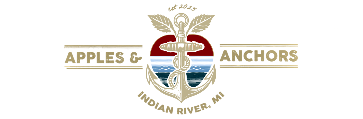 Apples & Anchors logo with anchor over apple design, Indian River, MI.